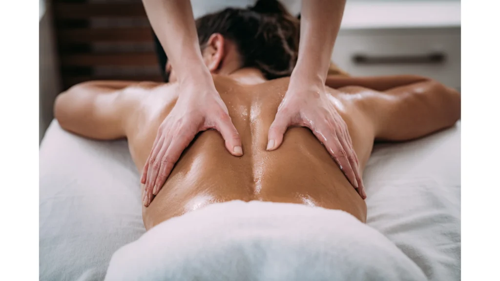 a women having a massage to reduce back pain